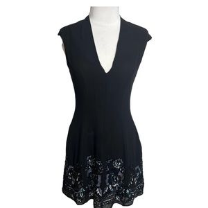 Needle and Thread vneck mini dress with beaded hem. Never worn . Tags on .